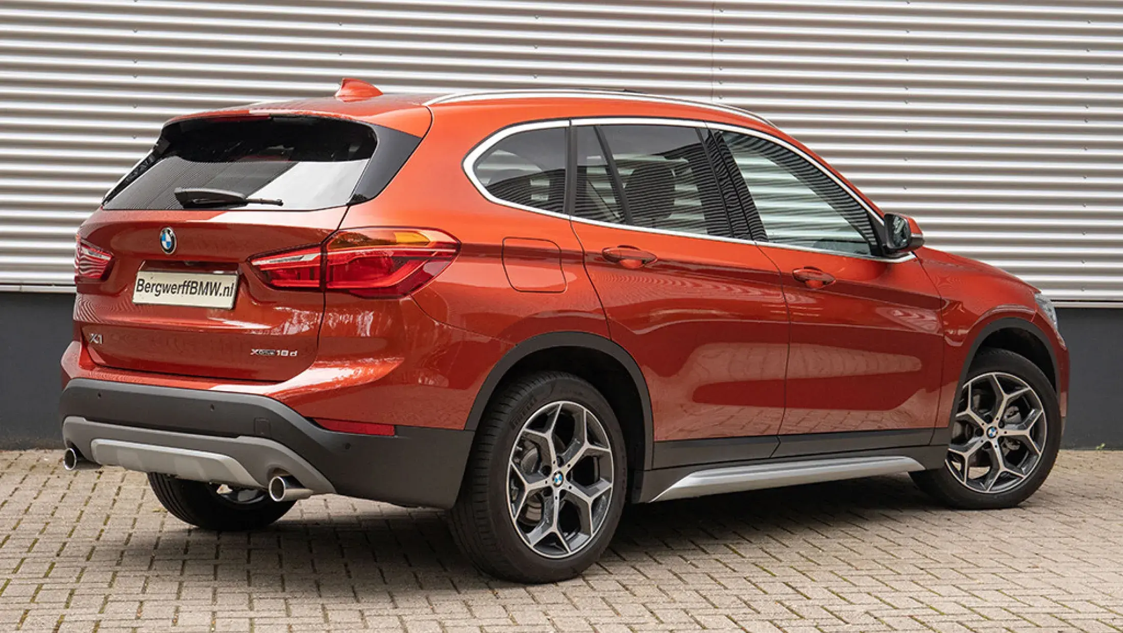 BMW X1 xDrive18d Memoryzetels Sunset Orange Dakota Oyster F48 Bergwerff