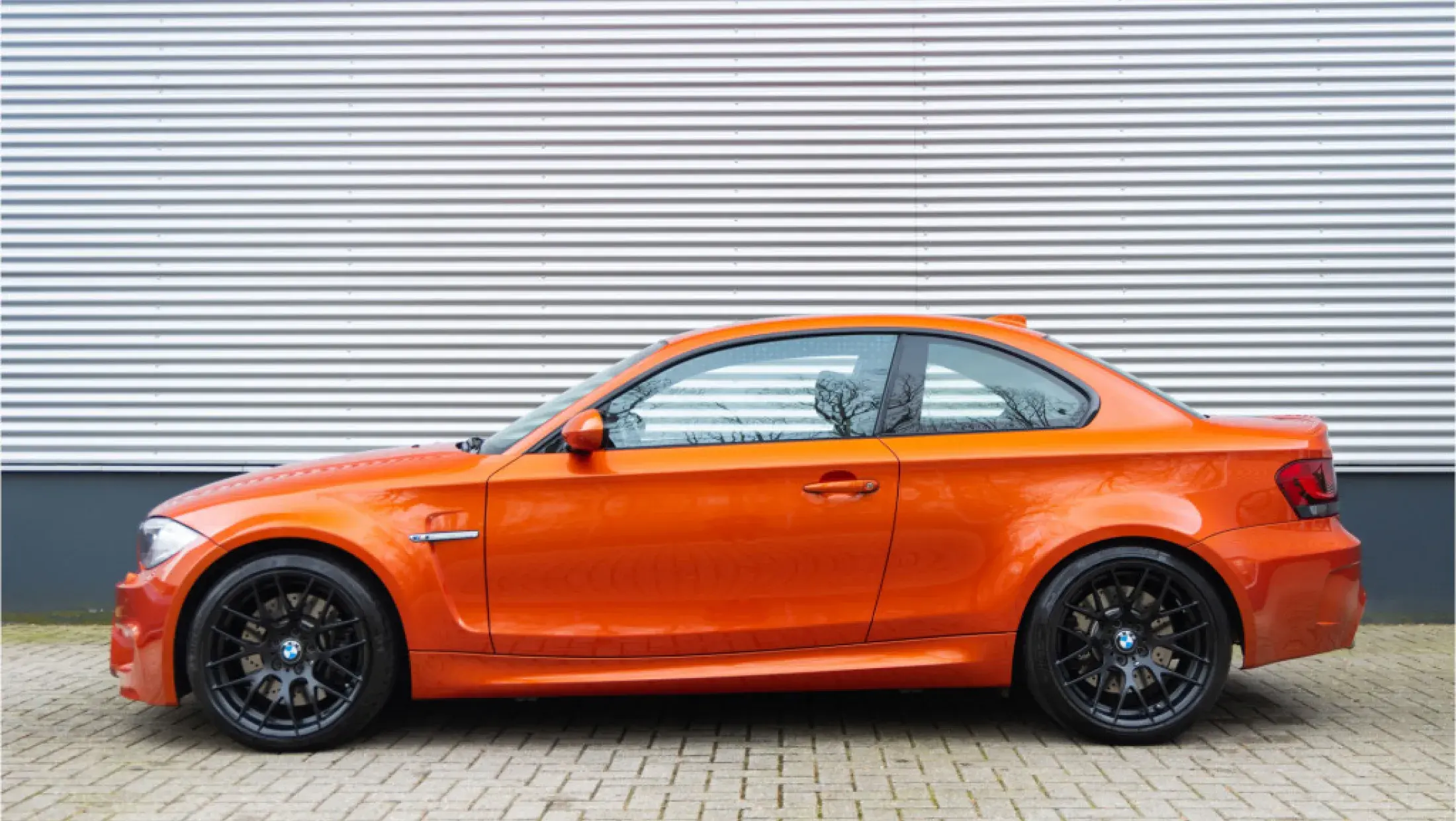 BMW 1M Coupe E82 Valencia Orange Metallic Leder Boston Schwarz met oranje contrasterend stiksel 2011