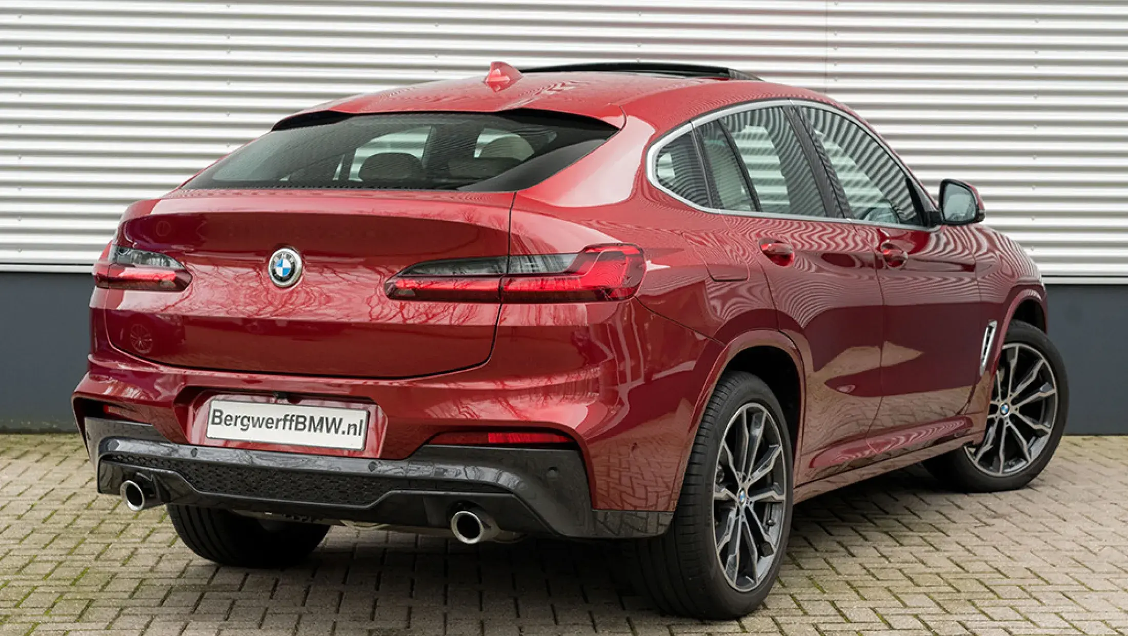 BMW X4 30i Flamenco Red Pearl BMW Individual uitgebreid lederen bekleding Elfenbrown G02 SUV