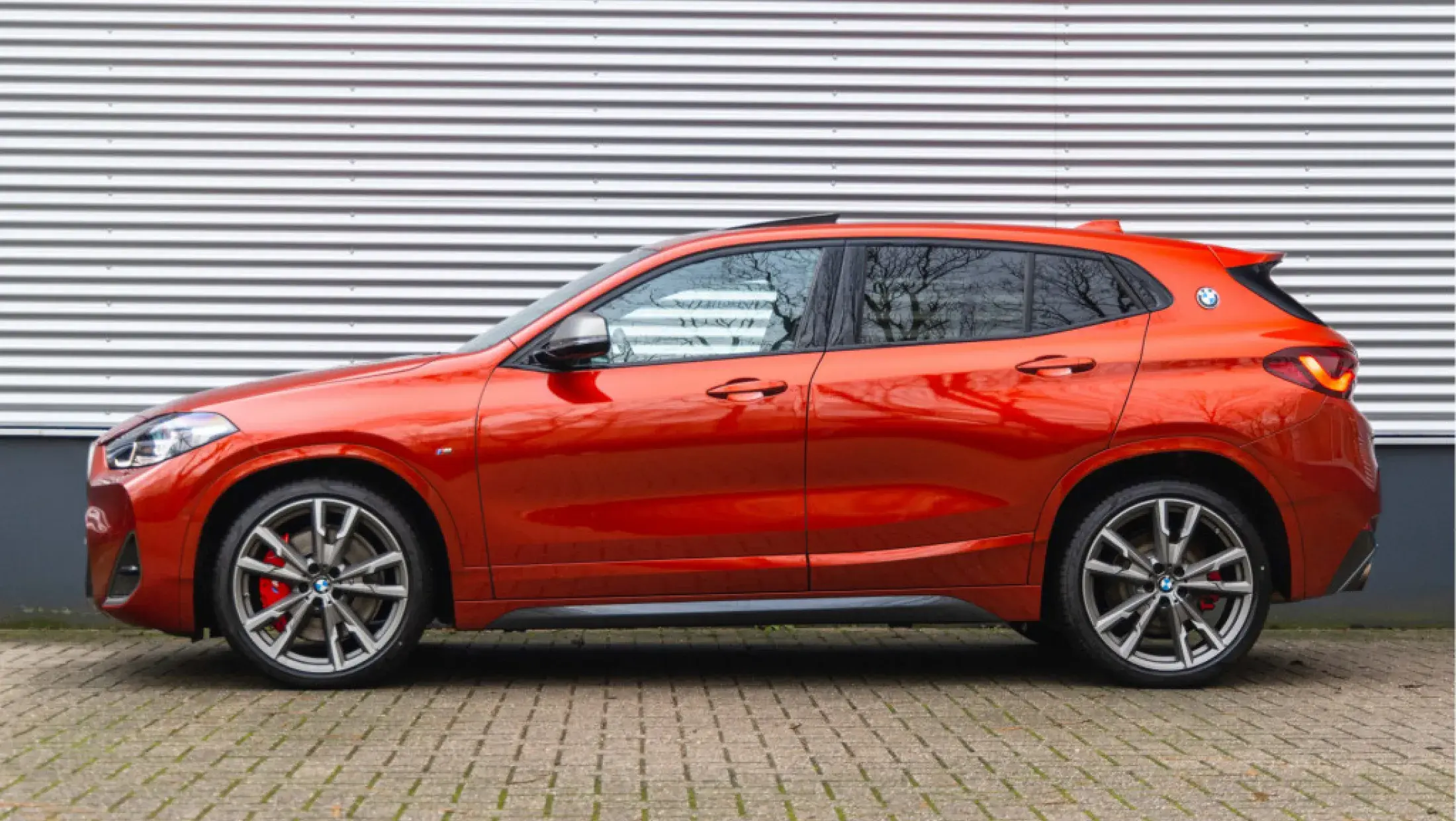BMW M235i Full Option Sunset Orange metallic F39 SUV Leder Dakota Schwarz geperforeerd