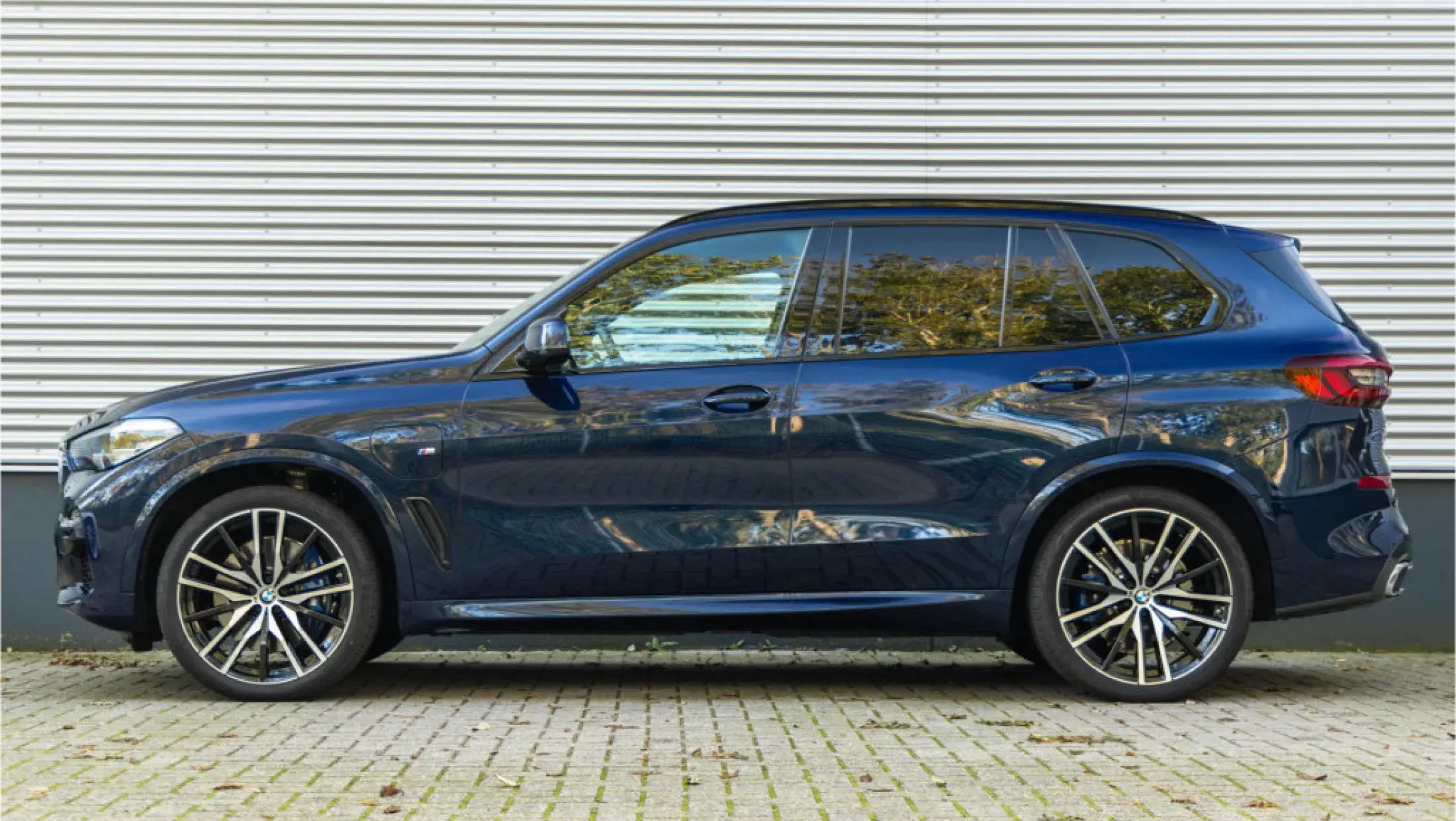 BMW X5 xDrive45e Tansanitblau Vernasca design Schwarz leder SUV G05 plugin hybride