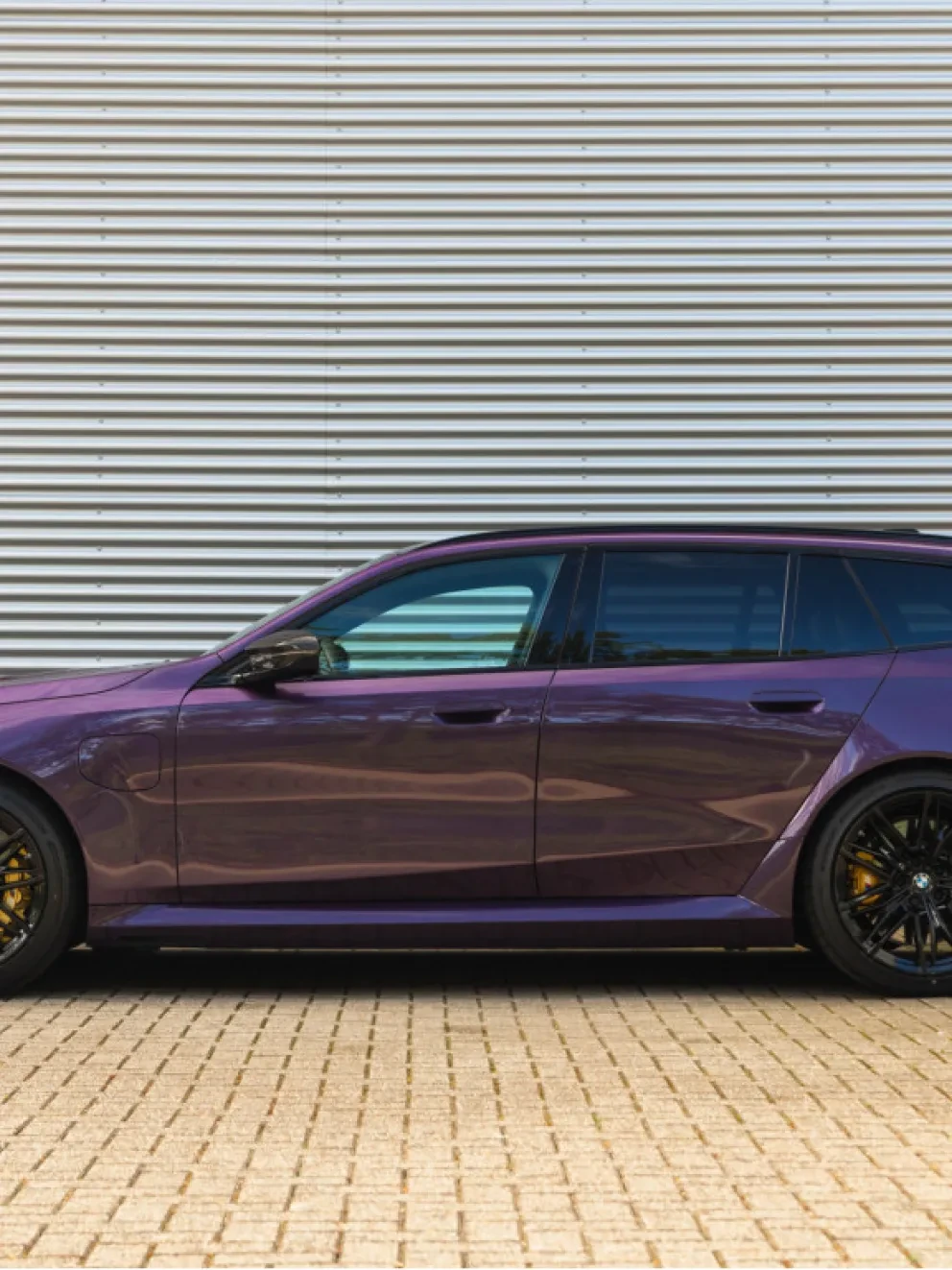 BMW M5 Touring Individual Daytonaviolett leder Meriono Silverstone Schwarz G99